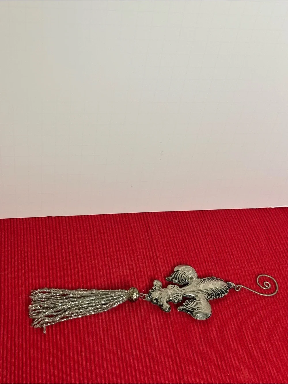 Metal Fleur-de-Lis Hanging Ornament with Silver tone Tassel